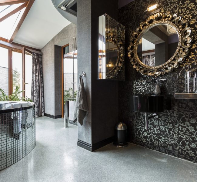 Futuristic dark bathroom with bathtub